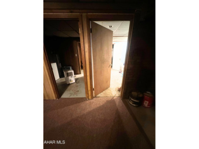 Located on a sprawling one-acre lot, this bi-level home offers on Iron Masters Country Club in Pennsylvania - for sale on GolfHomes.com, golf home, golf lot