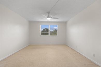 Experience the vibrant, active South Florida lifestyle in this on Wynmoor Golf Course in Florida - for sale on GolfHomes.com, golf home, golf lot