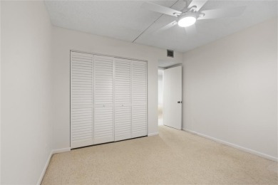 Experience the vibrant, active South Florida lifestyle in this on Wynmoor Golf Course in Florida - for sale on GolfHomes.com, golf home, golf lot