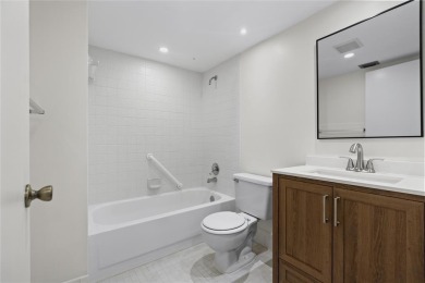 Experience the vibrant, active South Florida lifestyle in this on Wynmoor Golf Course in Florida - for sale on GolfHomes.com, golf home, golf lot