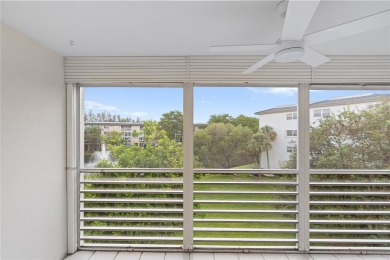 Experience the vibrant, active South Florida lifestyle in this on Wynmoor Golf Course in Florida - for sale on GolfHomes.com, golf home, golf lot