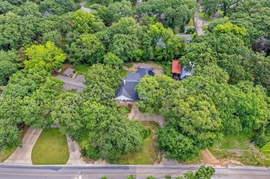 Experience resort-style living in this beautiful 4-bedroom on Hide-A-Way Lake Golf Course in Texas - for sale on GolfHomes.com, golf home, golf lot