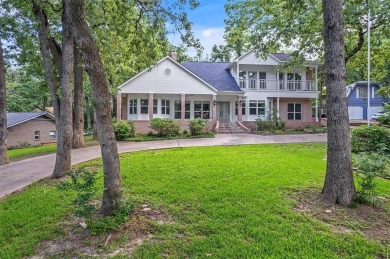 Experience resort-style living in this beautiful 4-bedroom on Hide-A-Way Lake Golf Course in Texas - for sale on GolfHomes.com, golf home, golf lot