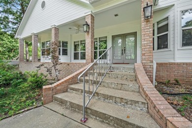 Experience resort-style living in this beautiful 4-bedroom on Hide-A-Way Lake Golf Course in Texas - for sale on GolfHomes.com, golf home, golf lot