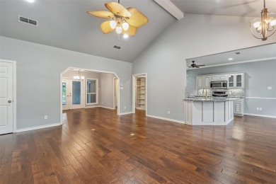 Experience resort-style living in this beautiful 4-bedroom on Hide-A-Way Lake Golf Course in Texas - for sale on GolfHomes.com, golf home, golf lot