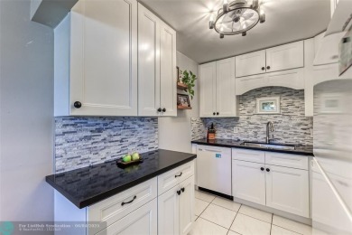 This charming, partially furnished, two bedroom, one and a half on Hillsboro Pines Golf in Florida - for sale on GolfHomes.com, golf home, golf lot