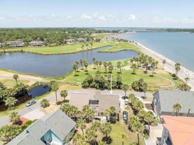 Welcome to this stunning duplex, boasting some of the best views on Ocean Point Golf Links in South Carolina - for sale on GolfHomes.com, golf home, golf lot