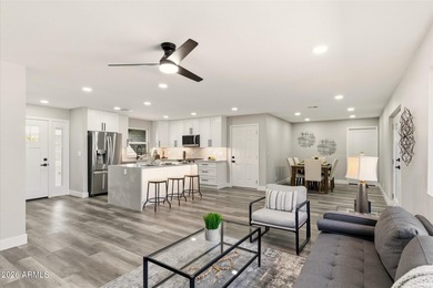 Completely remodeled home with beautiful new LVP flooring on Sunland Village Golf Club in Arizona - for sale on GolfHomes.com, golf home, golf lot