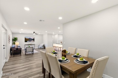 Completely remodeled home with beautiful new LVP flooring on Sunland Village Golf Club in Arizona - for sale on GolfHomes.com, golf home, golf lot