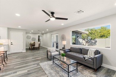 Completely remodeled home with beautiful new LVP flooring on Sunland Village Golf Club in Arizona - for sale on GolfHomes.com, golf home, golf lot