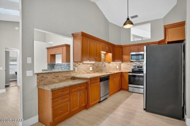 Discover a rare opportunity to own a 4 bedroom, 2 bathroom home on Spruce Creek Golf Club in Florida - for sale on GolfHomes.com, golf home, golf lot