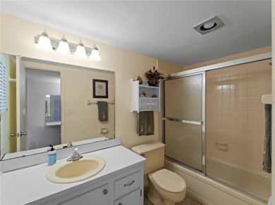 Peaceful water views, two pools, and access to kayak storage on Rotonda Golf and Country Club The Hills Course in Florida - for sale on GolfHomes.com, golf home, golf lot