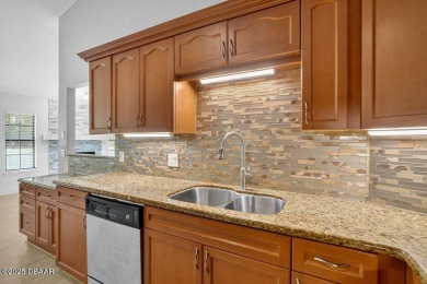 Discover a rare opportunity to own a 4 bedroom, 2 bathroom home on Spruce Creek Golf Club in Florida - for sale on GolfHomes.com, golf home, golf lot