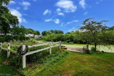 Look no further than this exceptional brick and wood ranch home on Turkeyfoot Lake Golf Links in Ohio - for sale on GolfHomes.com, golf home, golf lot