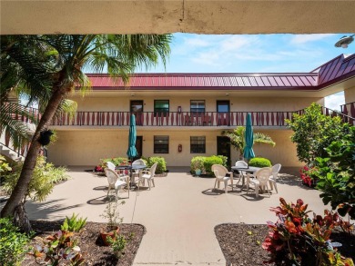 Peaceful water views, two pools, and access to kayak storage on Rotonda Golf and Country Club The Hills Course in Florida - for sale on GolfHomes.com, golf home, golf lot