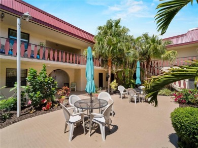 Peaceful water views, two pools, and access to kayak storage on Rotonda Golf and Country Club The Hills Course in Florida - for sale on GolfHomes.com, golf home, golf lot