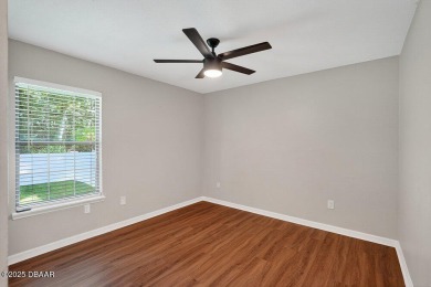 Discover a rare opportunity to own a 4 bedroom, 2 bathroom home on Spruce Creek Golf Club in Florida - for sale on GolfHomes.com, golf home, golf lot