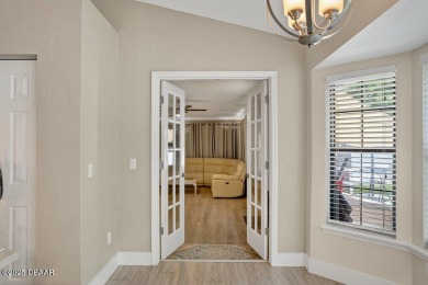 Discover a rare opportunity to own a 4 bedroom, 2 bathroom home on Spruce Creek Golf Club in Florida - for sale on GolfHomes.com, golf home, golf lot