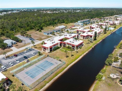 Peaceful water views, two pools, and access to kayak storage on Rotonda Golf and Country Club The Hills Course in Florida - for sale on GolfHomes.com, golf home, golf lot