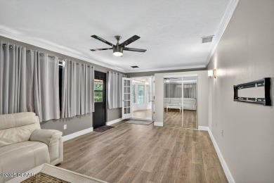 Discover a rare opportunity to own a 4 bedroom, 2 bathroom home on Spruce Creek Golf Club in Florida - for sale on GolfHomes.com, golf home, golf lot