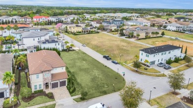 Rare opportunity to own a prime corner vacant lot located within on ChampionsGate Golf Resort in Florida - for sale on GolfHomes.com, golf home, golf lot