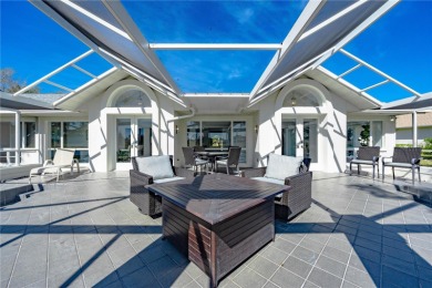 Under contract-accepting backup offers. Exquisitely remodeled on River Wilderness Golf and Country Club in Florida - for sale on GolfHomes.com, golf home, golf lot