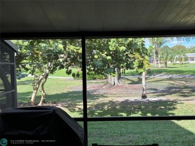 Welcome to this hidden gem in The Trellises in Jacaranda C.C. in on Jacaranda Golf Club in Florida - for sale on GolfHomes.com, golf home, golf lot