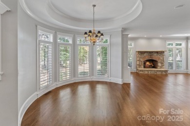 Welcome to 105 Gammon Point Ct - a elegant 4BR home nestled on on Trump National Golf Club Charlotte in North Carolina - for sale on GolfHomes.com, golf home, golf lot