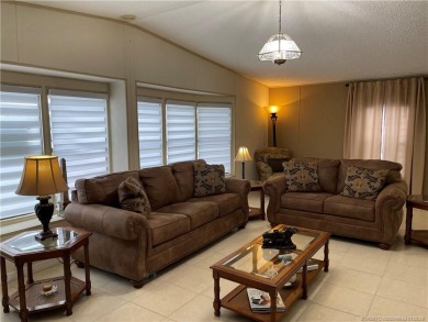 This 2 BR/2 bath home has so much to offer! Furnished, designer on Indianwood Golf and Country Club in Florida - for sale on GolfHomes.com, golf home, golf lot