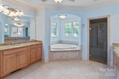 Welcome to 105 Gammon Point Ct - a elegant 4BR home nestled on on Trump National Golf Club Charlotte in North Carolina - for sale on GolfHomes.com, golf home, golf lot