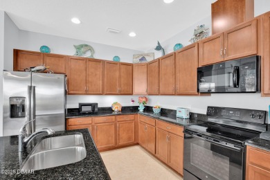 Privacy Galore!  Huge lot with heated POOL and LAKE view! The on LPGA International Golf Course in Florida - for sale on GolfHomes.com, golf home, golf lot