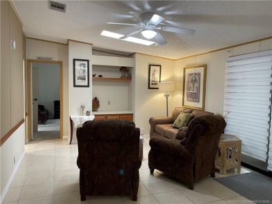 This 2 BR/2 bath home has so much to offer! Furnished, designer on Indianwood Golf and Country Club in Florida - for sale on GolfHomes.com, golf home, golf lot