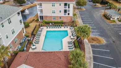 First floor condo situated on the Greg Norman Golf Course at on Barefoot Resort and Golf Club  in South Carolina - for sale on GolfHomes.com, golf home, golf lot