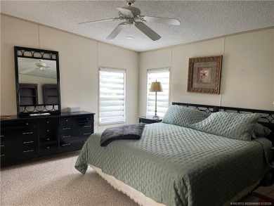 This 2 BR/2 bath home has so much to offer! Furnished, designer on Indianwood Golf and Country Club in Florida - for sale on GolfHomes.com, golf home, golf lot