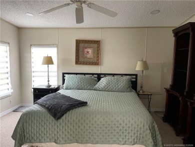 This 2 BR/2 bath home has so much to offer! Furnished, designer on Indianwood Golf and Country Club in Florida - for sale on GolfHomes.com, golf home, golf lot