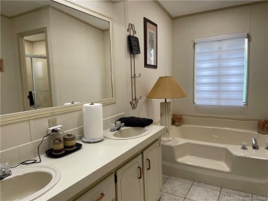 This 2 BR/2 bath home has so much to offer! Furnished, designer on Indianwood Golf and Country Club in Florida - for sale on GolfHomes.com, golf home, golf lot