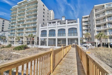 First floor condo situated on the Greg Norman Golf Course at on Barefoot Resort and Golf Club  in South Carolina - for sale on GolfHomes.com, golf home, golf lot