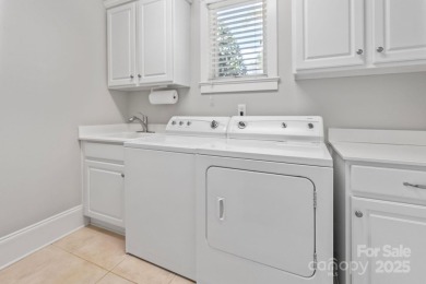 Welcome to 105 Gammon Point Ct - a elegant 4BR home nestled on on Trump National Golf Club Charlotte in North Carolina - for sale on GolfHomes.com, golf home, golf lot