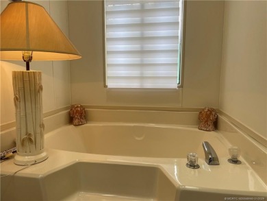 This 2 BR/2 bath home has so much to offer! Furnished, designer on Indianwood Golf and Country Club in Florida - for sale on GolfHomes.com, golf home, golf lot