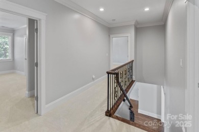 Welcome to 105 Gammon Point Ct - a elegant 4BR home nestled on on Trump National Golf Club Charlotte in North Carolina - for sale on GolfHomes.com, golf home, golf lot