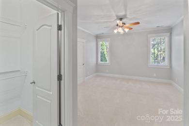 Welcome to 105 Gammon Point Ct - a elegant 4BR home nestled on on Trump National Golf Club Charlotte in North Carolina - for sale on GolfHomes.com, golf home, golf lot