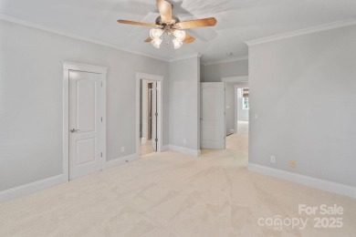 Welcome to 105 Gammon Point Ct - a elegant 4BR home nestled on on Trump National Golf Club Charlotte in North Carolina - for sale on GolfHomes.com, golf home, golf lot