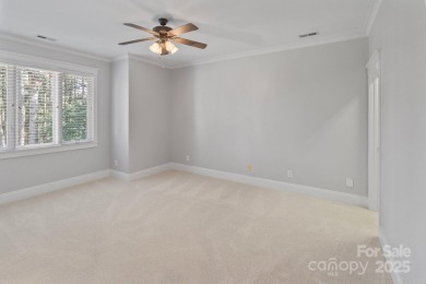 Welcome to 105 Gammon Point Ct - a elegant 4BR home nestled on on Trump National Golf Club Charlotte in North Carolina - for sale on GolfHomes.com, golf home, golf lot