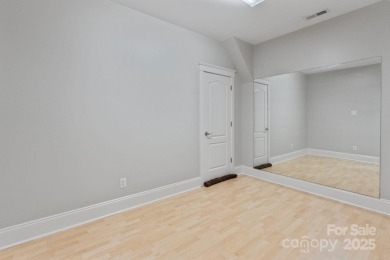 Welcome to 105 Gammon Point Ct - a elegant 4BR home nestled on on Trump National Golf Club Charlotte in North Carolina - for sale on GolfHomes.com, golf home, golf lot