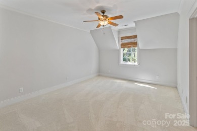 Welcome to 105 Gammon Point Ct - a elegant 4BR home nestled on on Trump National Golf Club Charlotte in North Carolina - for sale on GolfHomes.com, golf home, golf lot