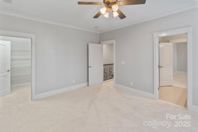 Welcome to 105 Gammon Point Ct - a elegant 4BR home nestled on on Trump National Golf Club Charlotte in North Carolina - for sale on GolfHomes.com, golf home, golf lot