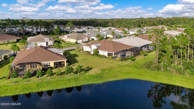 Privacy Galore!  Huge lot with heated POOL and LAKE view! The on LPGA International Golf Course in Florida - for sale on GolfHomes.com, golf home, golf lot
