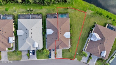 Privacy Galore!  Huge lot with heated POOL and LAKE view! The on LPGA International Golf Course in Florida - for sale on GolfHomes.com, golf home, golf lot
