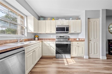 Wow! Beautiful  3-bedroom, 2.5-bathroom Townhouse Located In on Woodmont Country Club in Florida - for sale on GolfHomes.com, golf home, golf lot