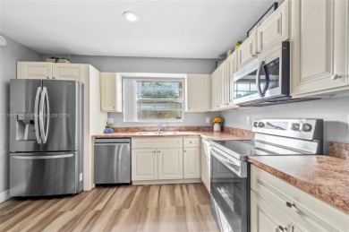 Wow! Beautiful  3-bedroom, 2.5-bathroom Townhouse Located In on Woodmont Country Club in Florida - for sale on GolfHomes.com, golf home, golf lot